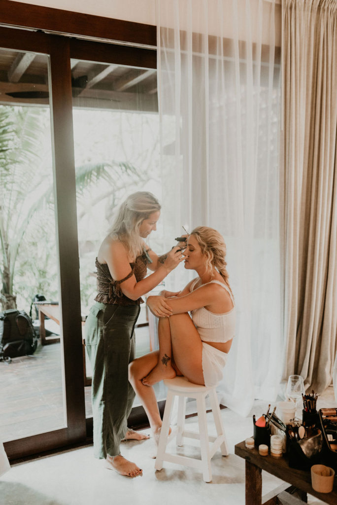 bride getting ready Jungle-Disco Tulum Wedding by Feather and North photography